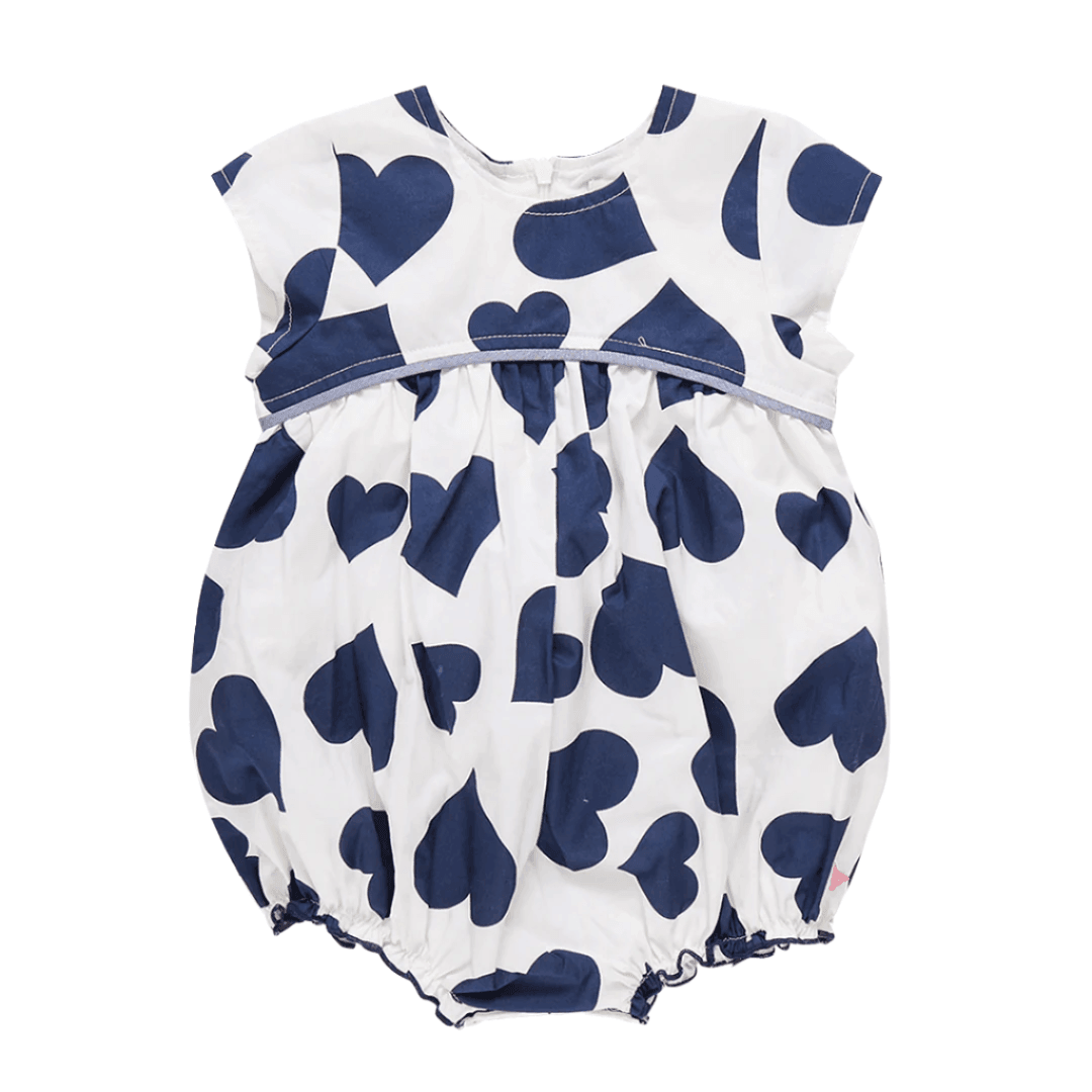This is a baby bubble, white background color with large navy hearts all over. short sleeve and empire waist 