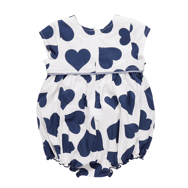 Back view of the baby bubble, white background color and large navy hearts all over the bubble. hidden zipper in the back. 