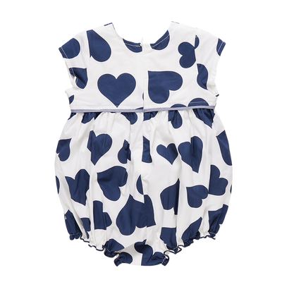 Back view of the baby bubble, white background color and large navy hearts all over the bubble. hidden zipper in the back. 