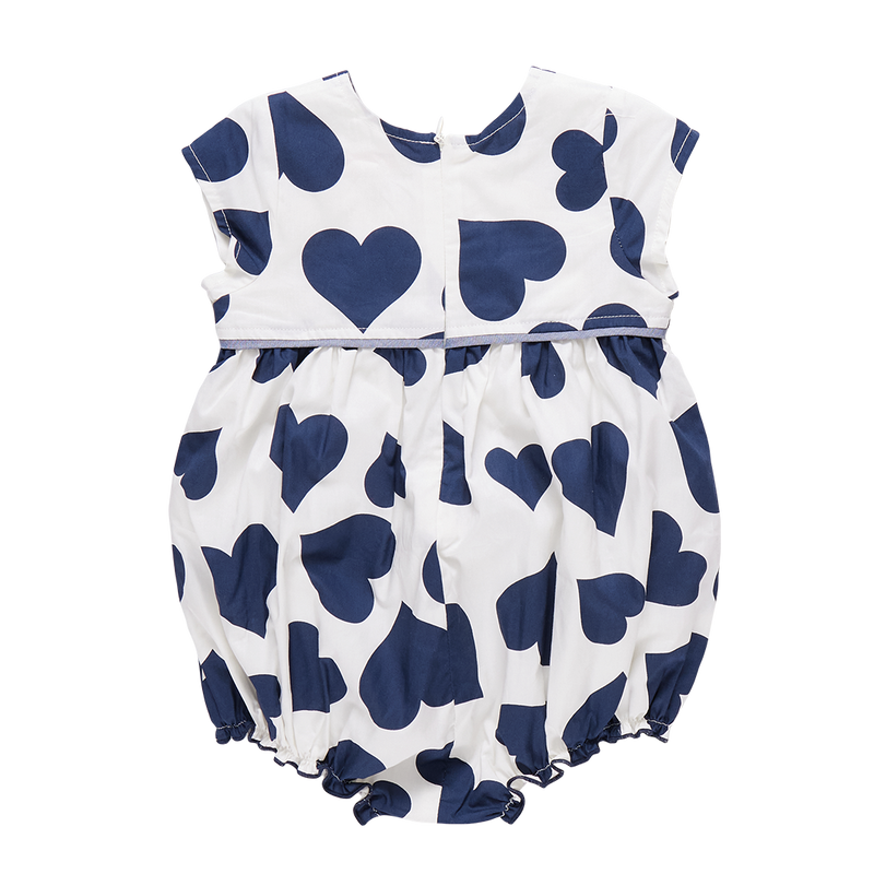 Back view of the baby bubble, white background color and large navy hearts all over the bubble. hidden zipper in the back. 