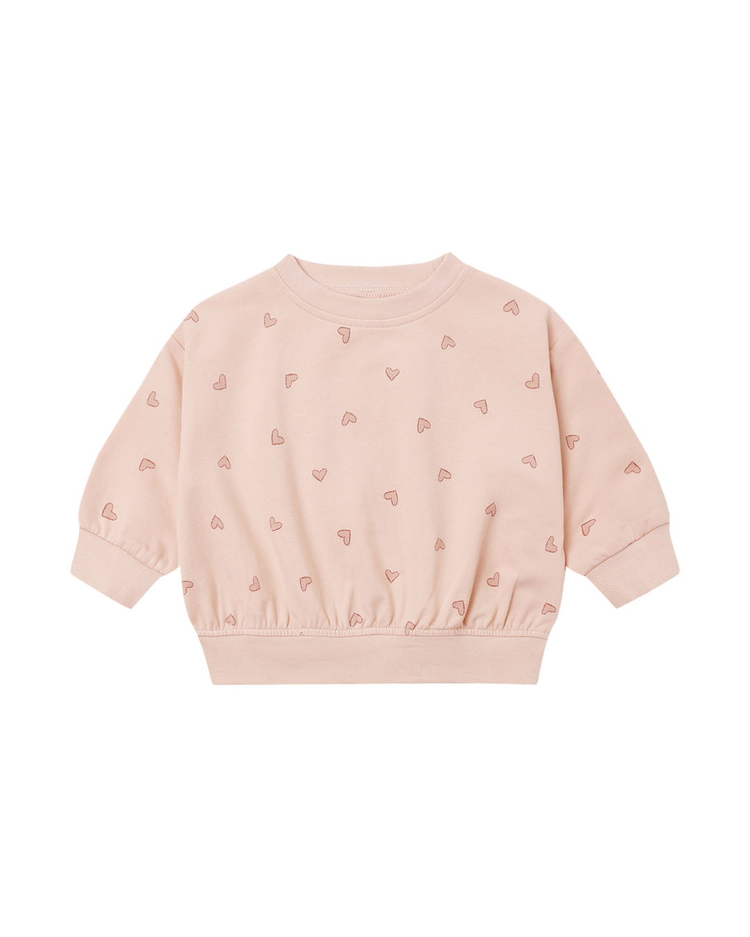 A light pink long-sleeve sweatshirt for toddlers, featuring a delicate all-over pattern of small pink hearts and a gathered elastic hem, displayed on a clean white background.
