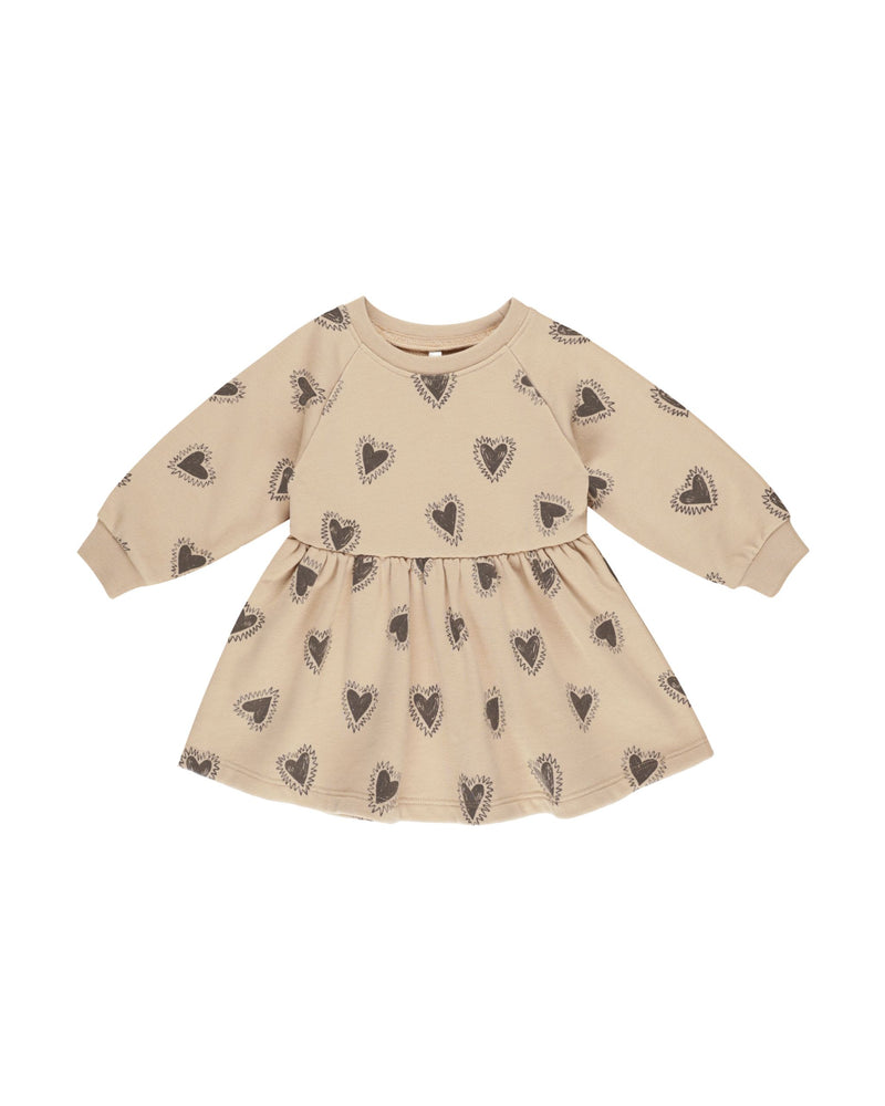 beige raglan dress, crewneck and long sleeve. beige color with gray/navy  hearts all over.