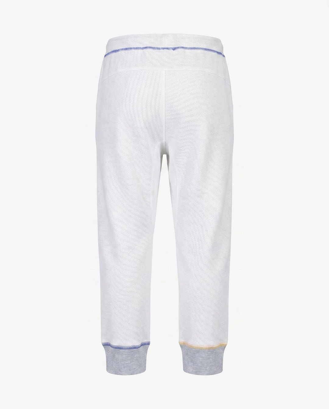 gray sweatpants with blue stitching from behind. 