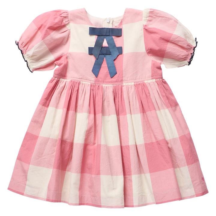 A pink and white gingham baby dress with puff sleeves, a gathered waist, and a blue ribbon bow on the chest.