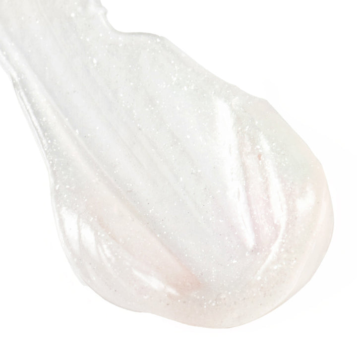 Close-up of a clear sparkly lip balm with glittery texture on a white background