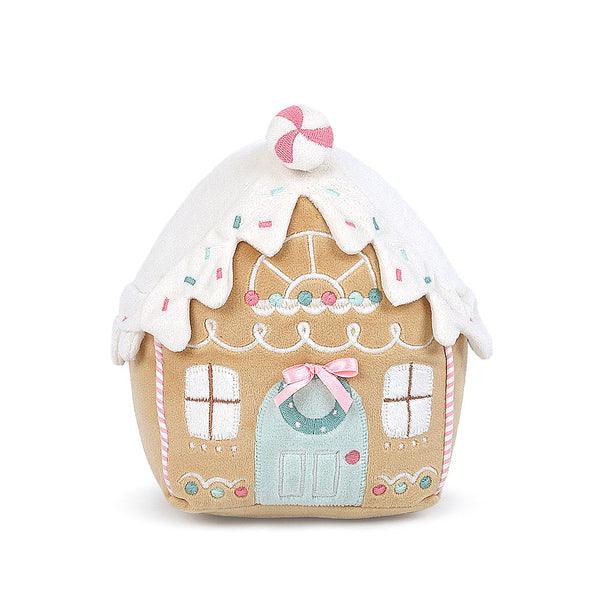 Stuffed gingerbread house with pink and teal accents