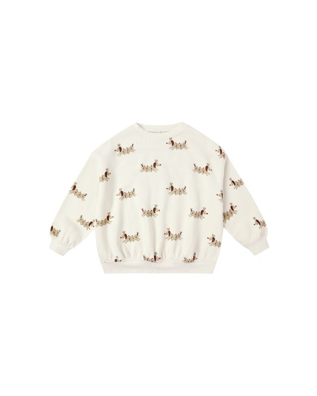 beige sweater with small christmas dog patterns on a white background