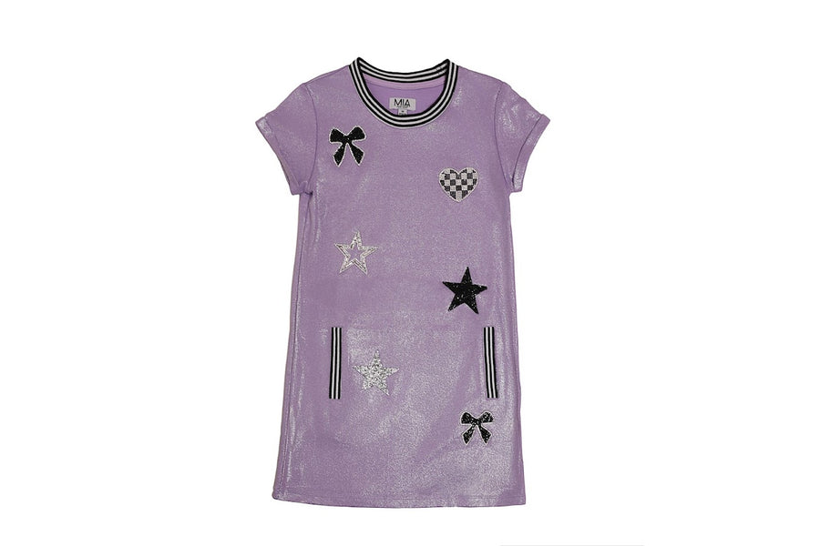 Purple dress with black star and bow patterns on a white background