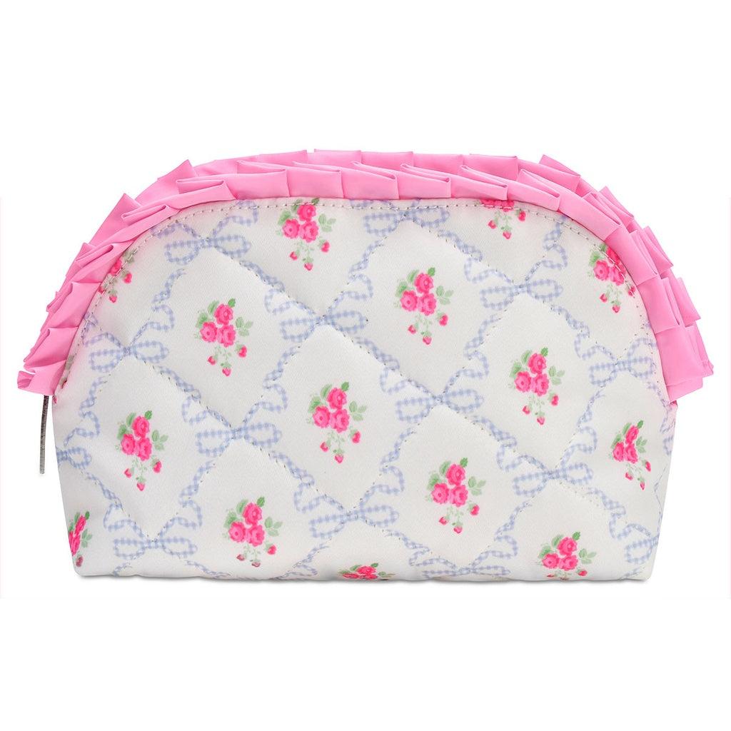 cosmetic bag white background with blue ribbons and small pink flowers all over. pink ruffle along the top of the bag. 