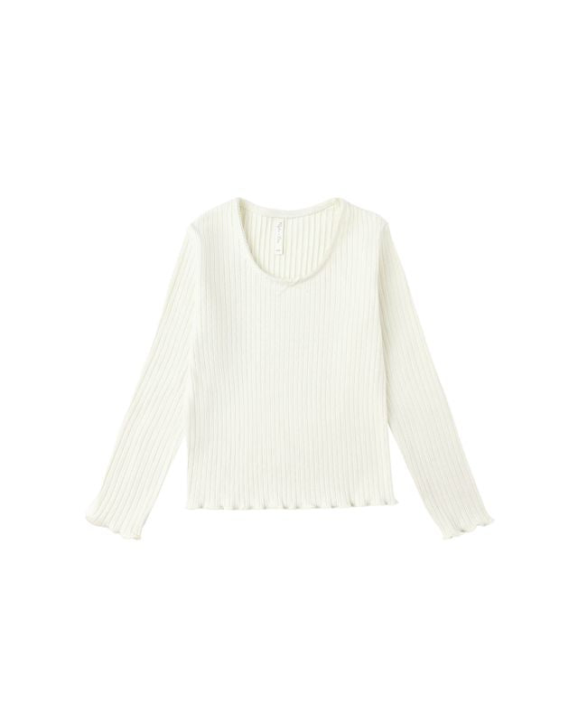 White ribbed top on a white background