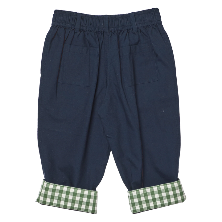 Back of Navy blue  pants with an elastic waistband, side pockets, and green and white gingham cuffs, shown flat on a white background.
