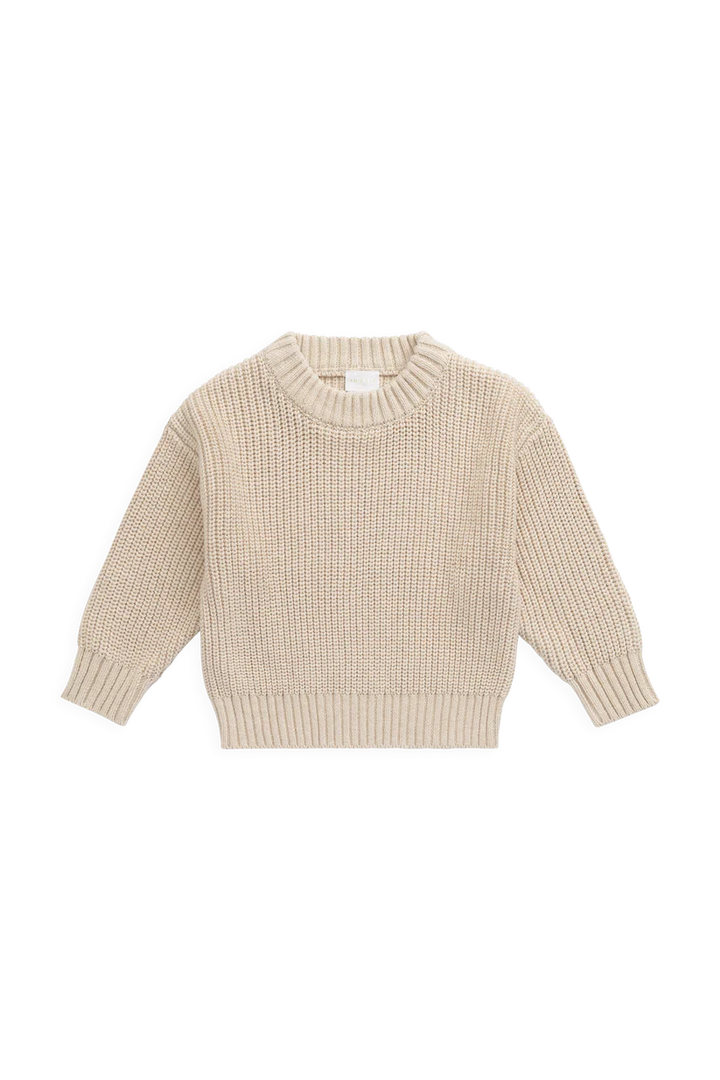 Beige knitted sweater on a white background