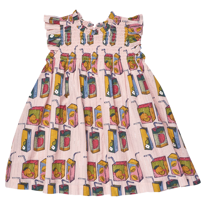 A sleeveless kid's dress with ruffled shoulder straps and a smocked bodice, featuring a pink and white striped base with a colorful print of juice carton illustrations.