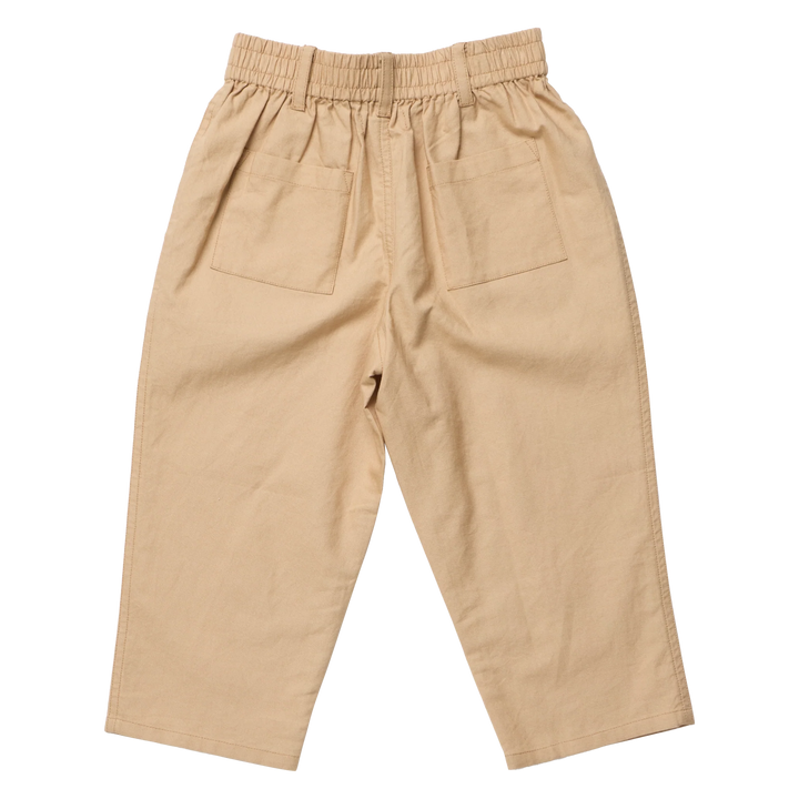 A pair of beige cotton trousers with an elastic waistband, pleated front, and two large patch pockets on the back, shown flat on a white background.