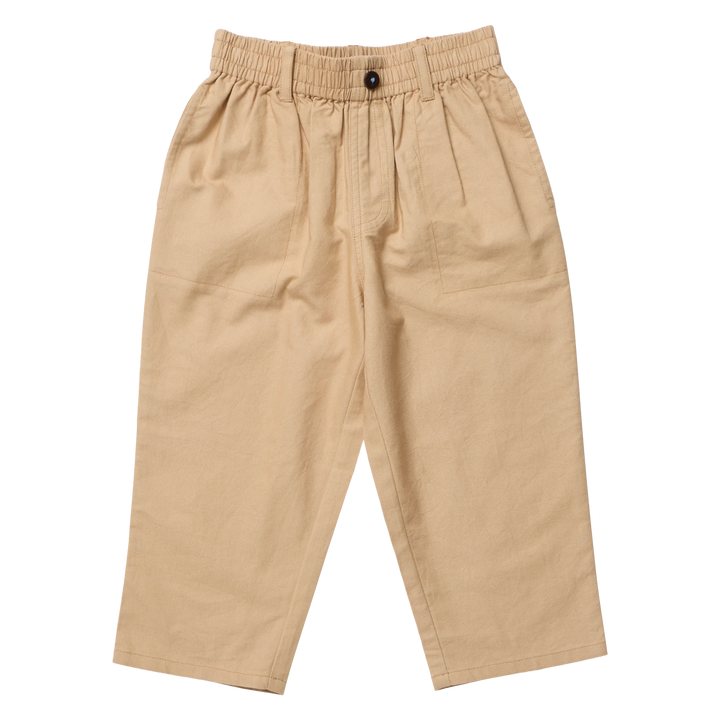 A pair of beige pleated trousers with an elastic waistband and a single black button, shown flat on a white background.