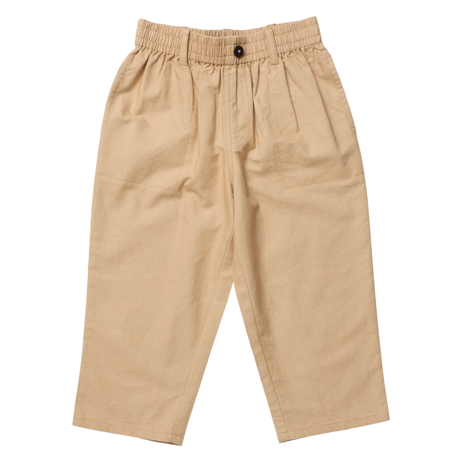 A pair of beige pleated trousers with an elastic waistband and a single black button, shown flat on a white background.