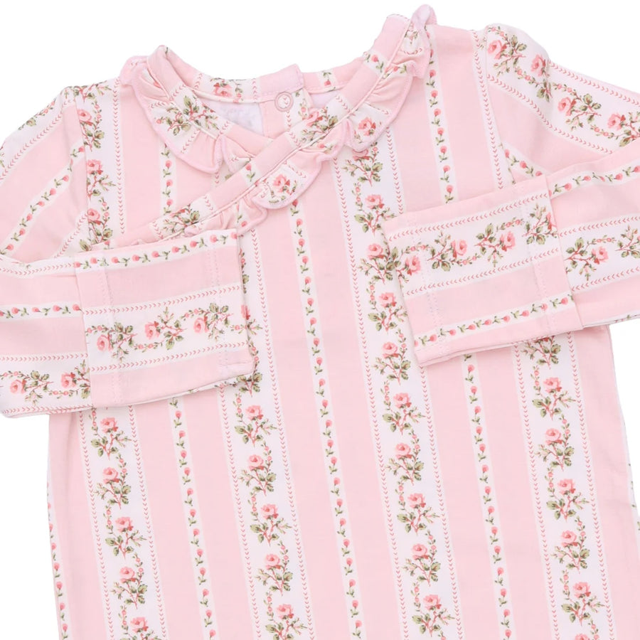 A pink long-sleeve baby top with vertical stripes, floral rose patterns, and a ruffled collar, shown on a plain white background.