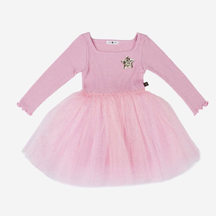 Pink dress with a tutu skirt on a white background