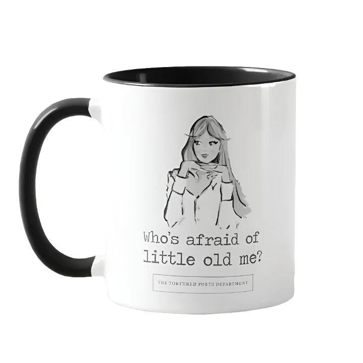 15 ounce coffee mug with a drawing of Taylor Swift posing with her hands under her chin and the text saying: Who's afraid of Little Old Me?"