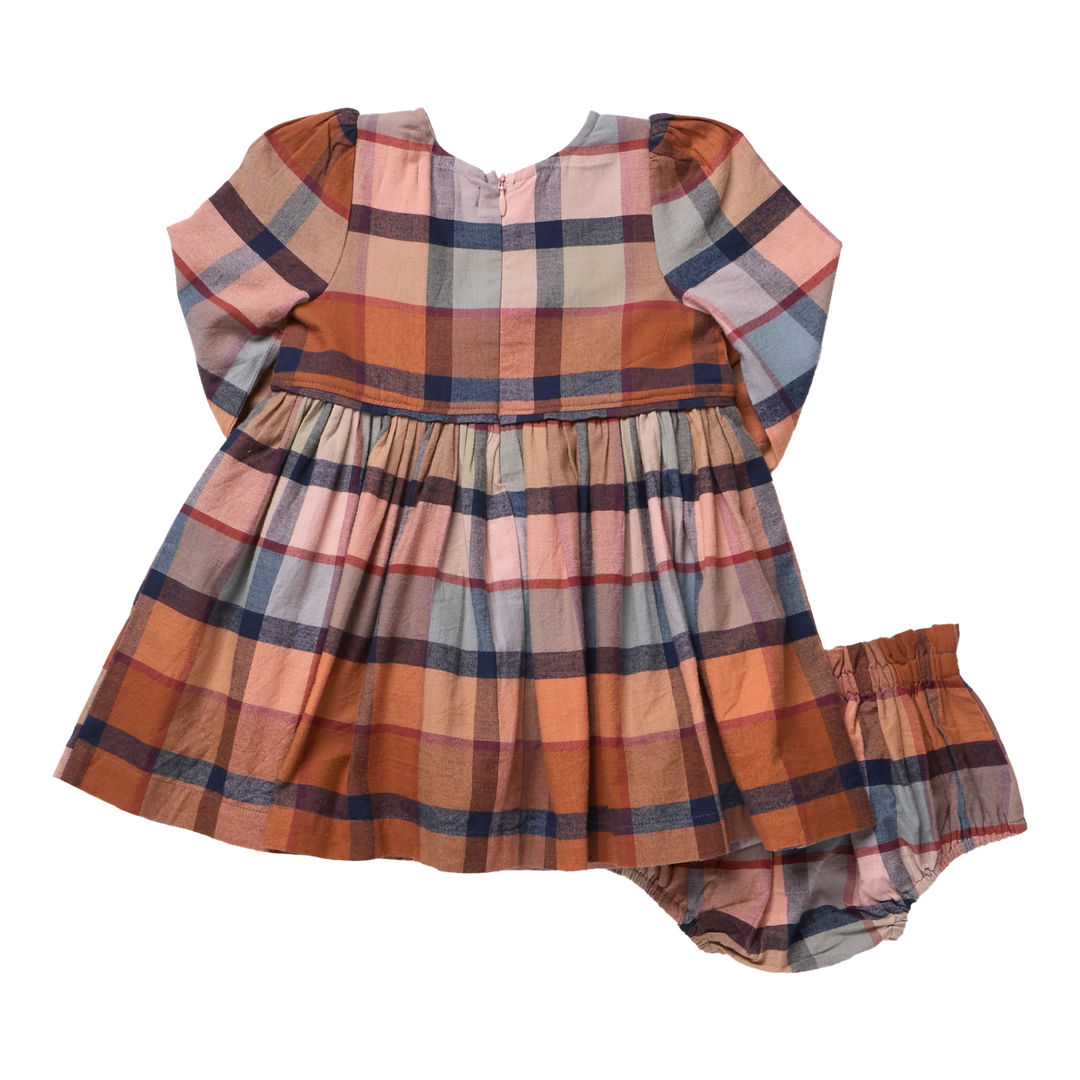 picture of the back of the rust plaid dress and the matching bloomer that goes under the dress. 
