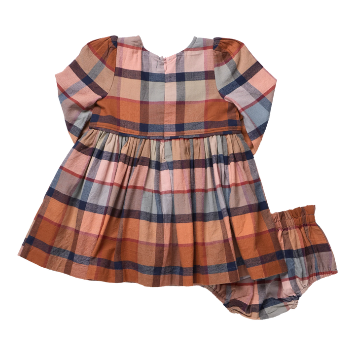 picture of the back of the rust plaid dress and the matching bloomer that goes under the dress. 