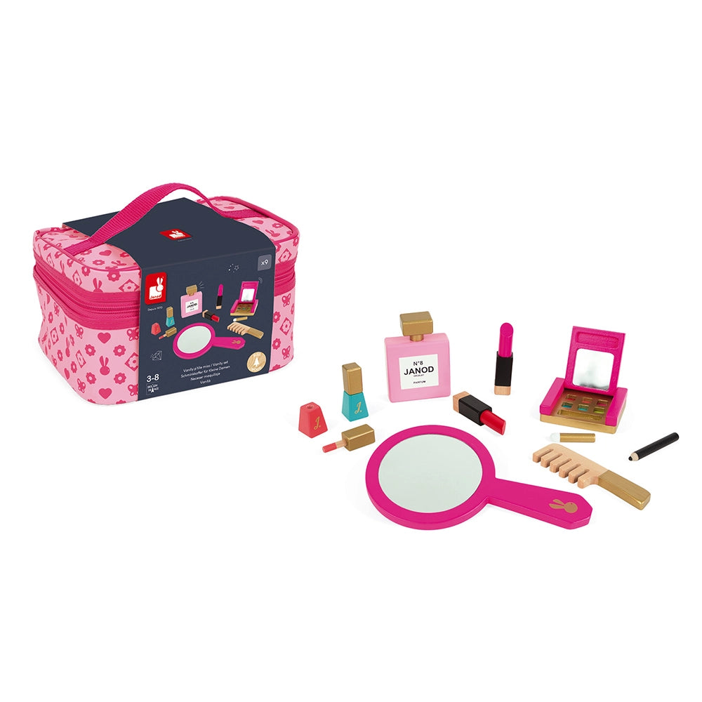 Children's toy makeup set with pink case and various makeup items on a white background