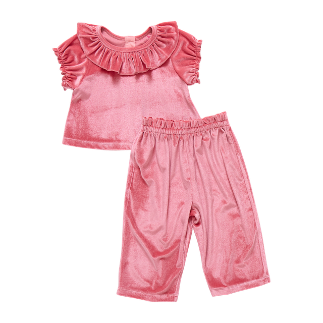 Pink children's velour outfit with top and pants on a white background