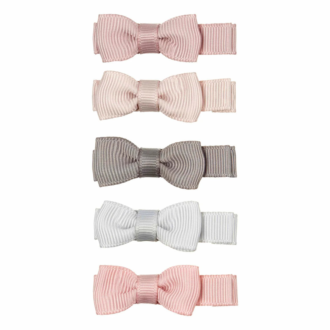 Five ribbon bow clips in soft pastel colors, including pink, blush, taupe, light gray, and pale pink, arranged vertically on a plain white background.