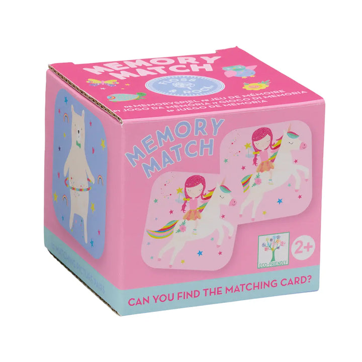 Pink packaging of a memory match game with illustrations of a girl and unicorn on a white background