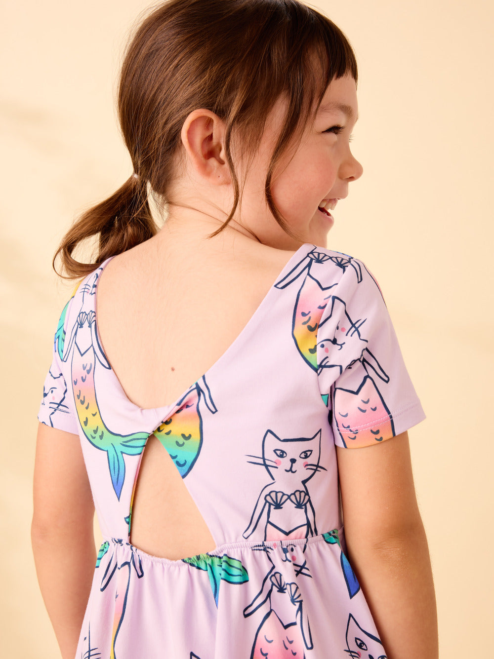 short sleeve dress with the back showing and a twist in the back