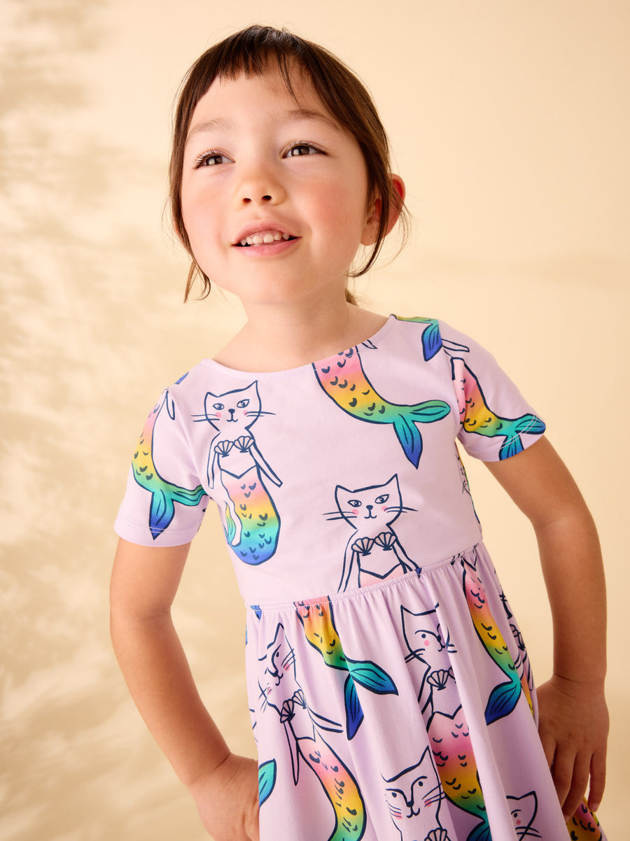 short sleeve dress in lavender with cats that look like rainbow mermaids