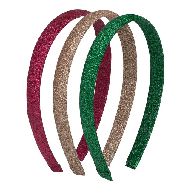 three glittery headbands in red, gold, and green on a white background