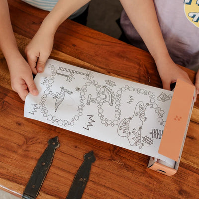 Kids coloring in Playpa Paper with Dinosaur Theme print