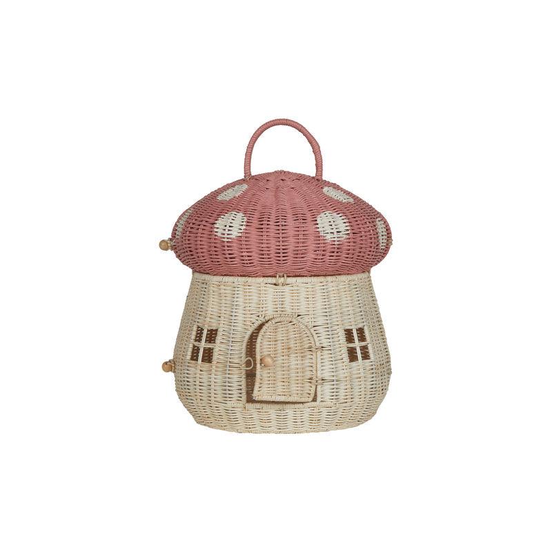 dollhouse shaped like a mushroom basket with a dusty rose pink mushroom top and handle. 