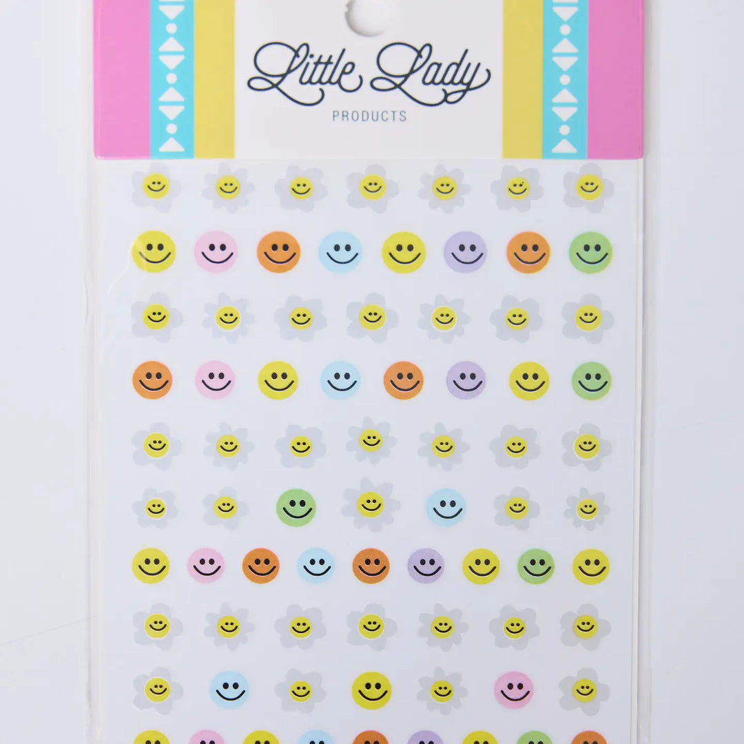 Pack of smiley face nail stickers with 'Little Lady' branding on a white background