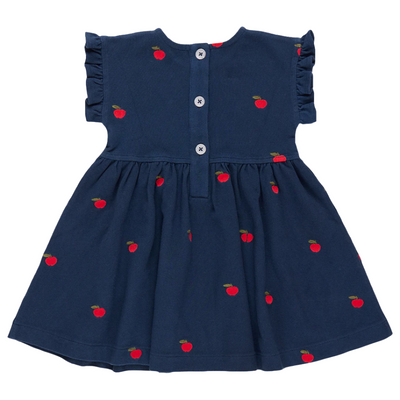 back of dress, navy pique cotton. red apples embroidered all over. small ruffles at the sleeve and buttons down the back. 