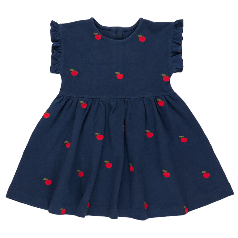 navy dress in a pique cotton material. red apples embroidered throughout. small ruffles at sleeve. 