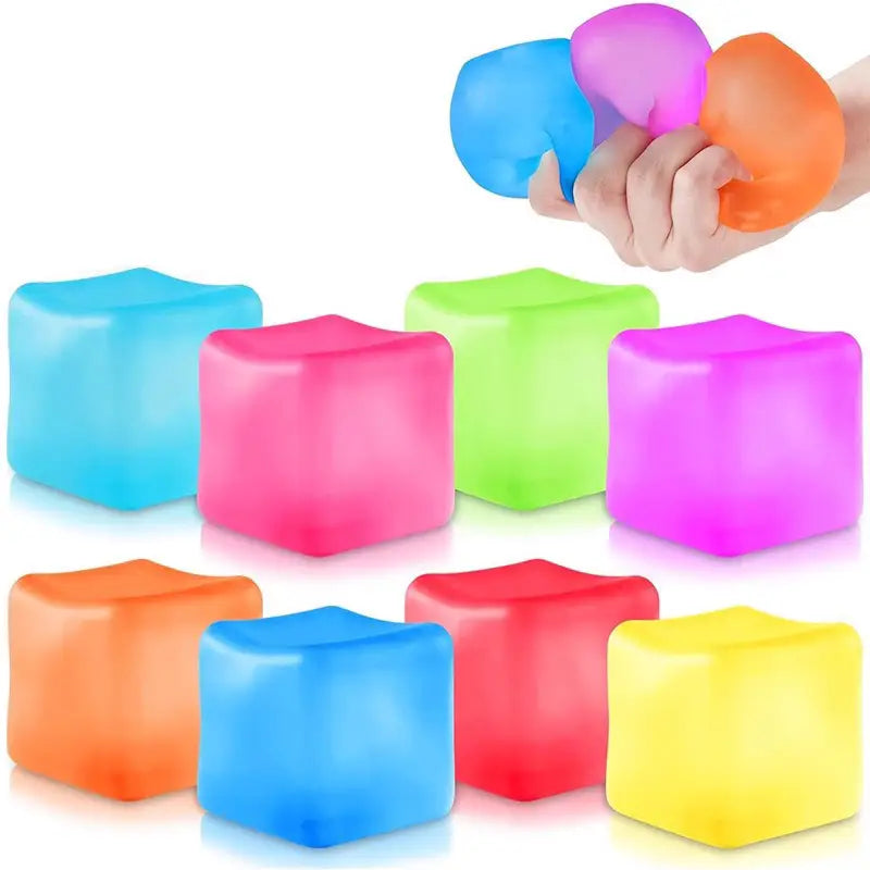 Colorful aquish ice cubes with a hand holding a blue, pink, and orange cube.