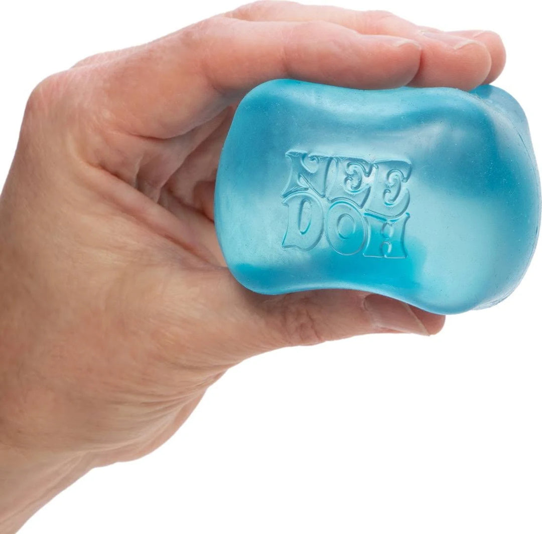 Hand holding a blue gelatinous product with 'Fettuccini' branding.