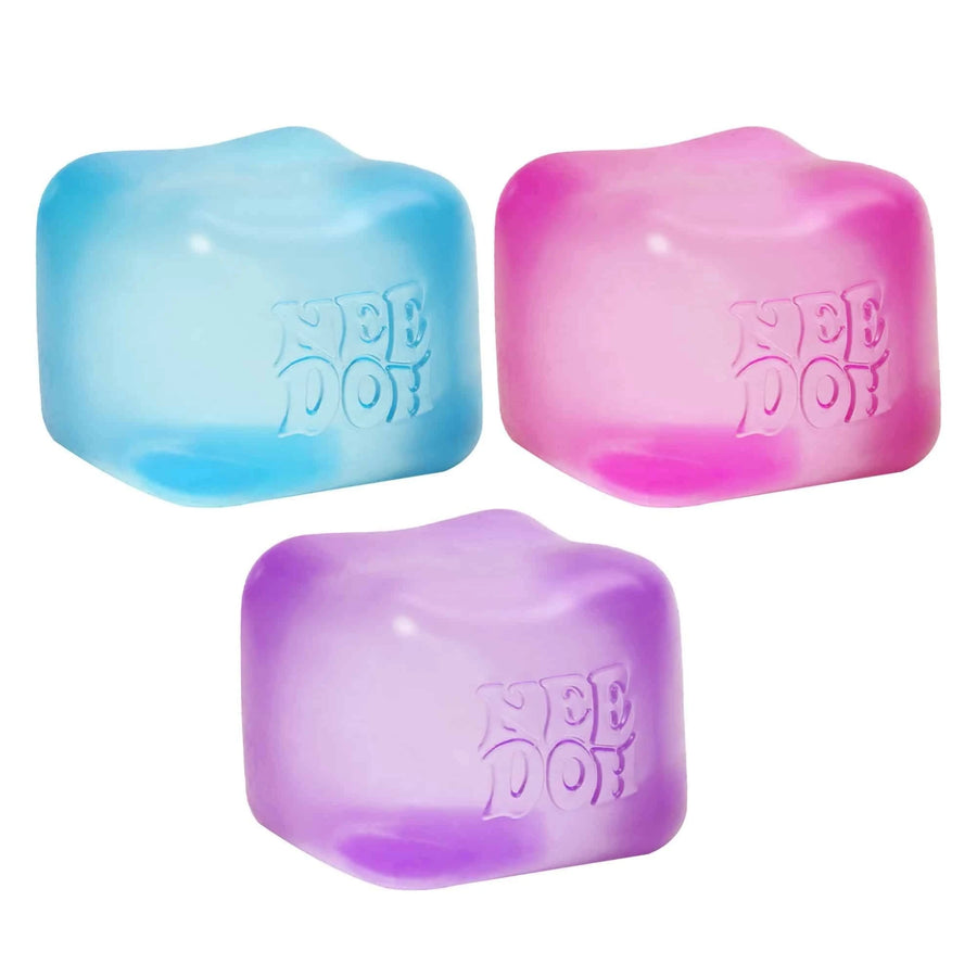 Three colorful ice cube-shaped dog toys with 'Nee Doh' branding on a white background.