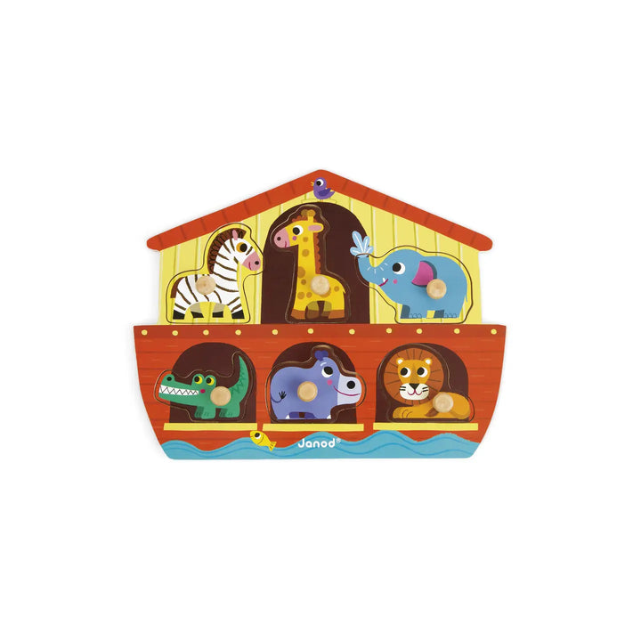 Colorful toy Noah's Ark with animals on a white background