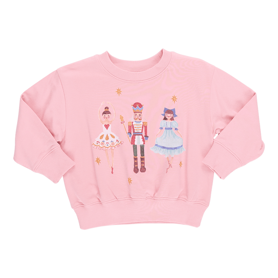 pink sweatshirt with the nutcracker, sugarplum fairy and clara on it.  The design is a watercolor design. 