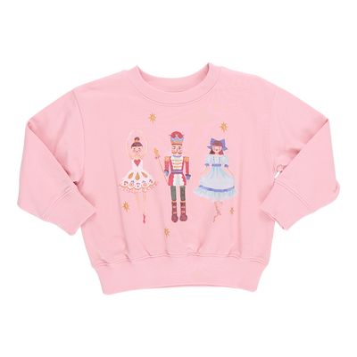 pink sweatshirt with the nutcracker, sugarplum fairy and clara on it.  The design is a watercolor design. 