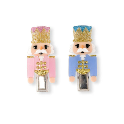 set of 2 nutcracker hair clips: one pink and one blue with gold glitter