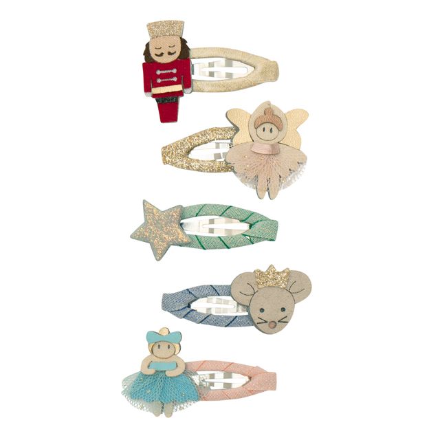 Set of decorative nutcracker theme hair clips with fairy, mouse, and star designs on a white background