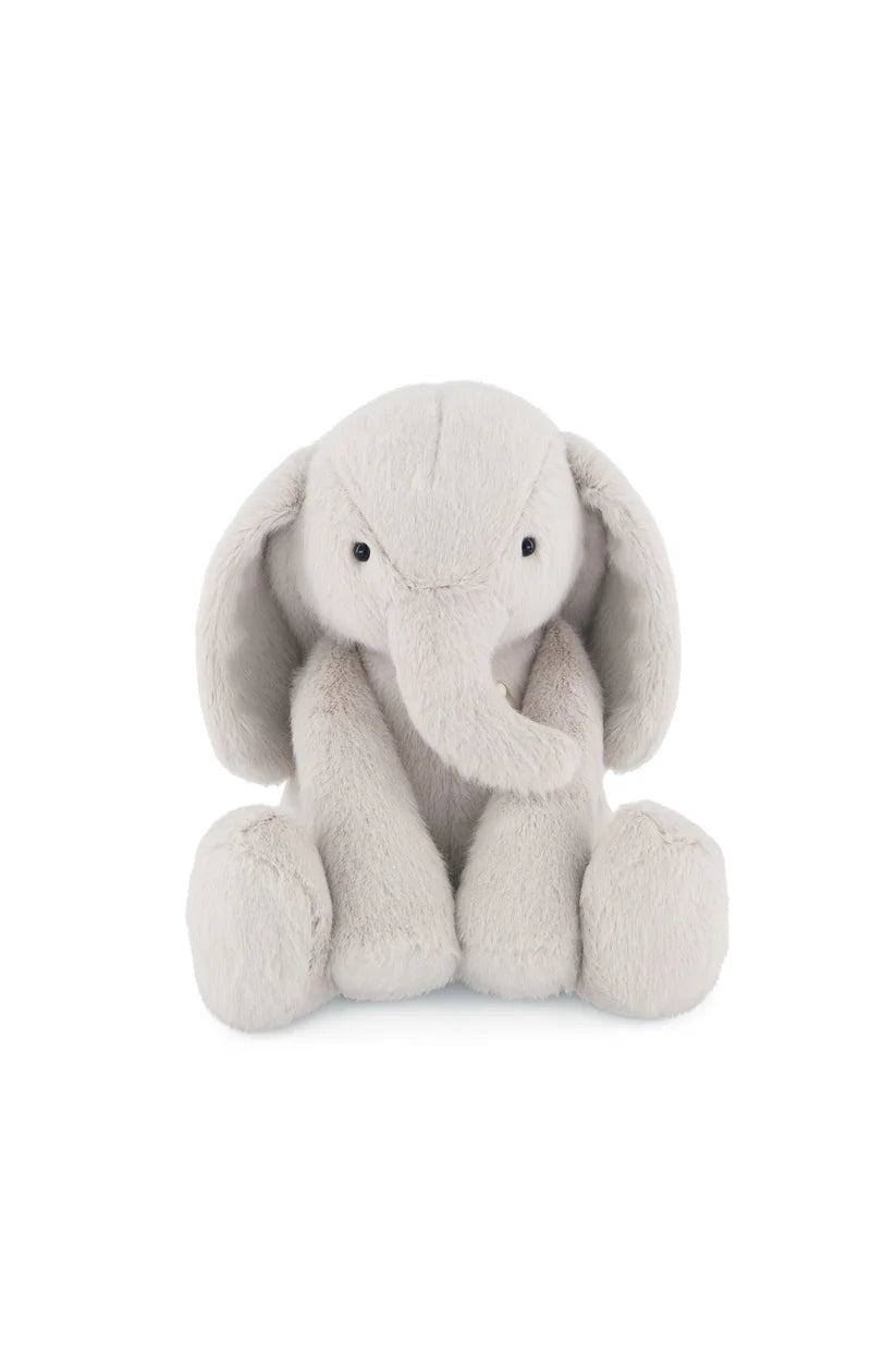 Plush elephant toy on a white background