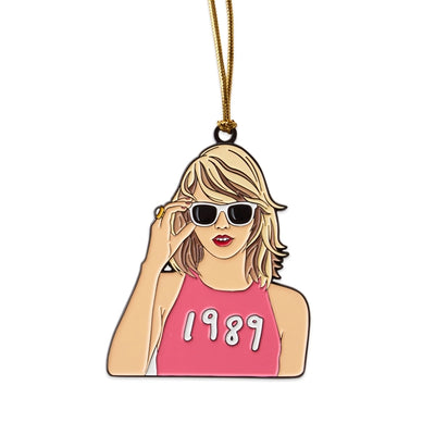 Taylor Swift Christmas ornament. Taylor is wearing a 1989 tank top. 