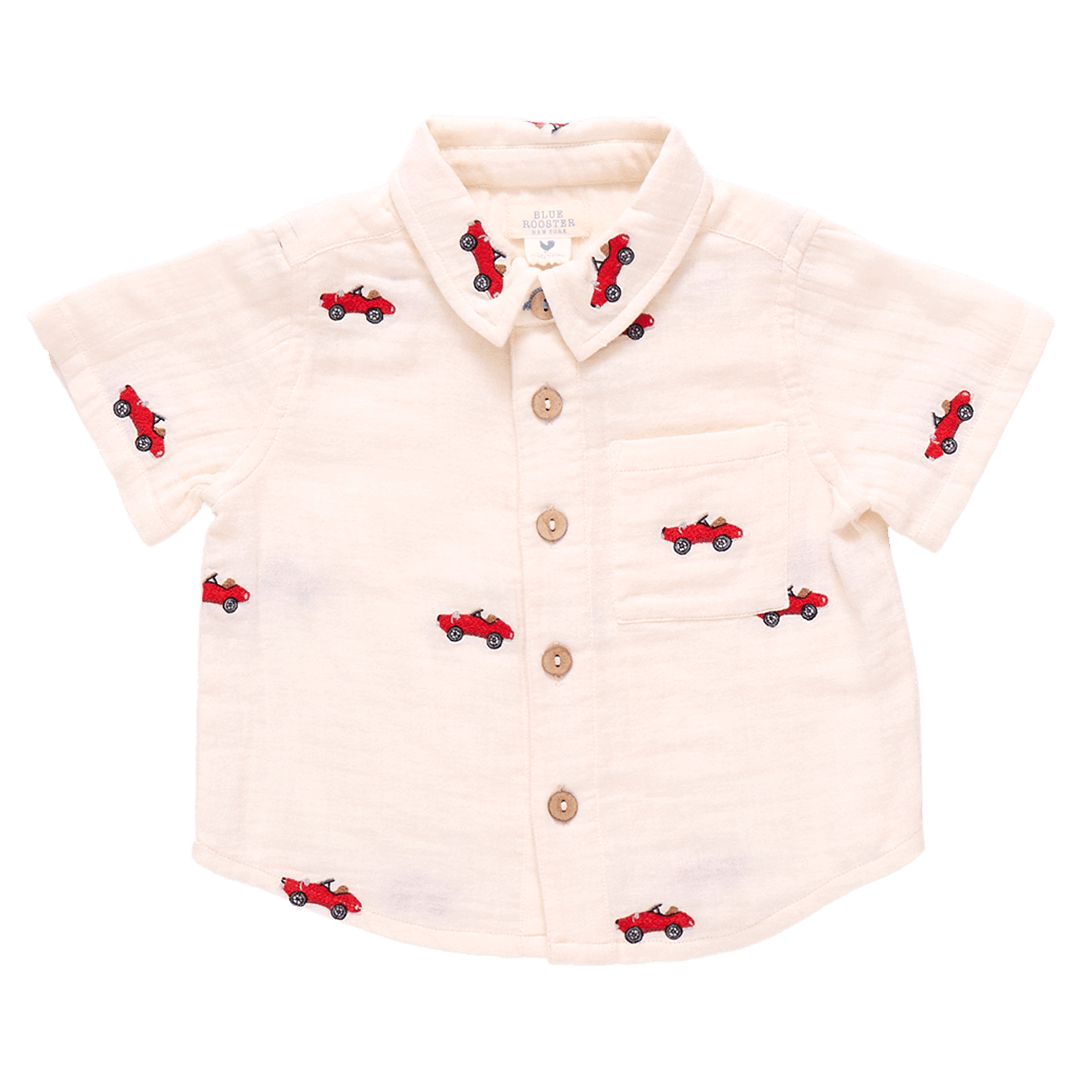 ivory button down cotton gauze shirt for boys with red embroidered cars on the shirt. 