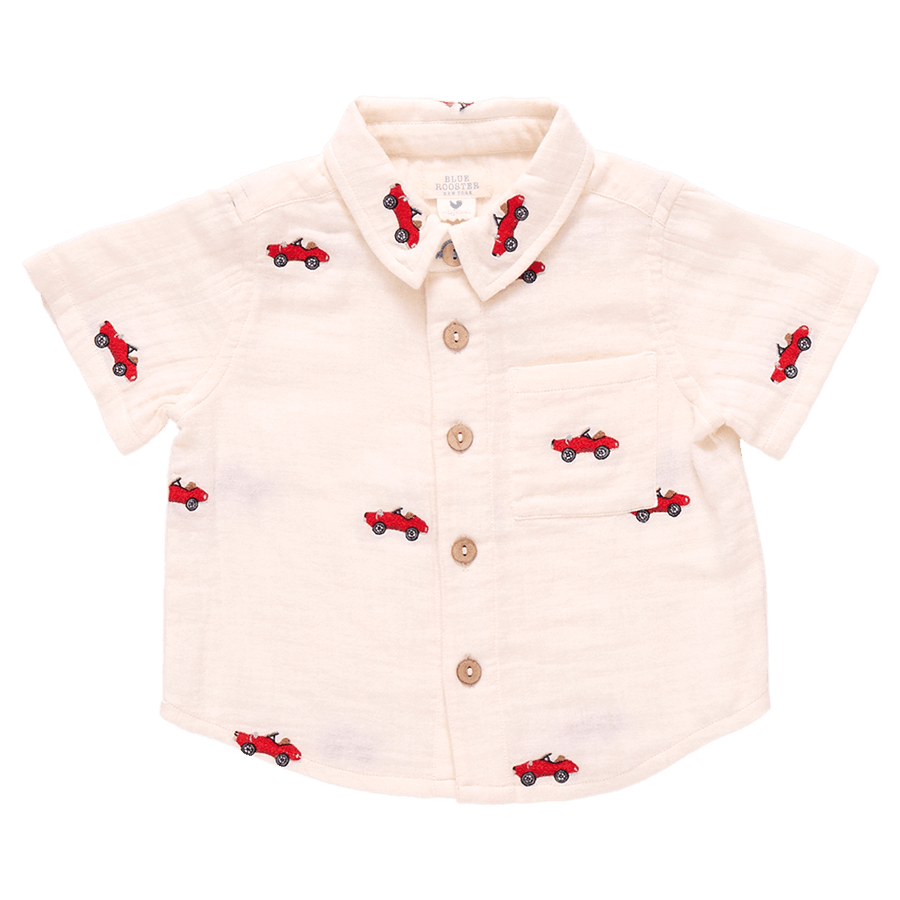 ivory button down cotton gauze shirt for boys with red embroidered cars on the shirt. 