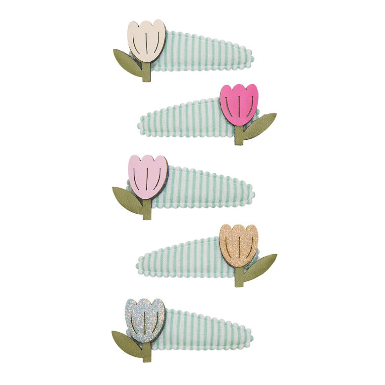 Set of five floral-themed hair clips with striped patterns on a white background